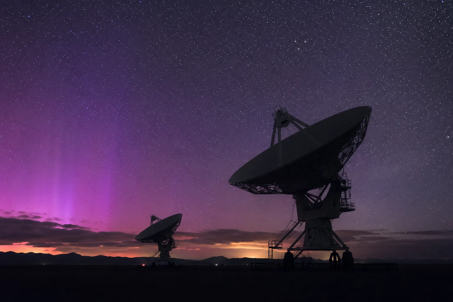 Photoreal editorial: radio telescope silhouette under stars